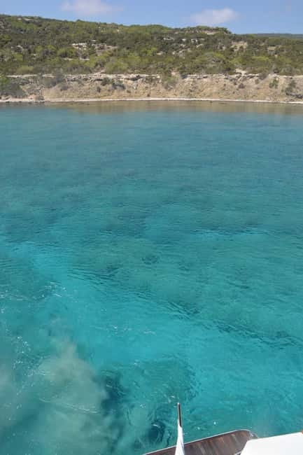 Polis: Blue Lagoon Boat Tour with bus from Paphos - Passing Aphrodite’s Baths