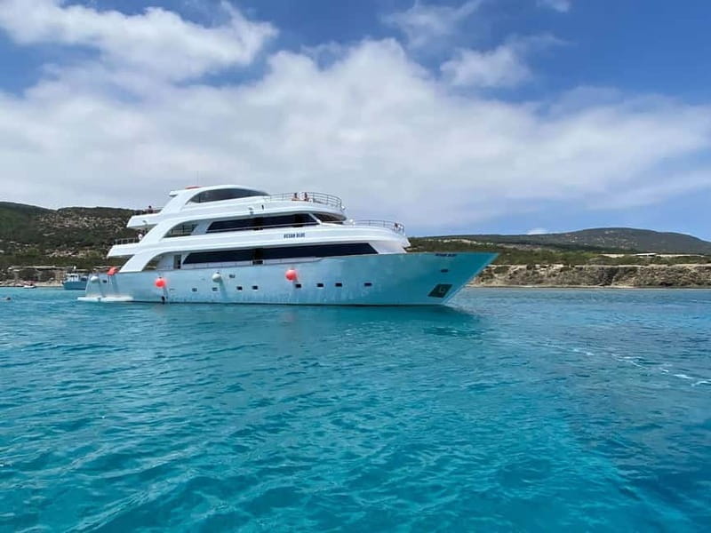 Polis: Blue Lagoon Boat Tour with bus from Paphos - Akamas Peninsula views from the sea