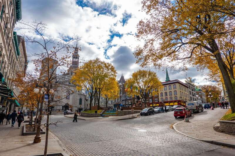 Quebec City: Old Town and Montmorency Falls Bus Tour - Meeting the colorful bus at Place d’Armes