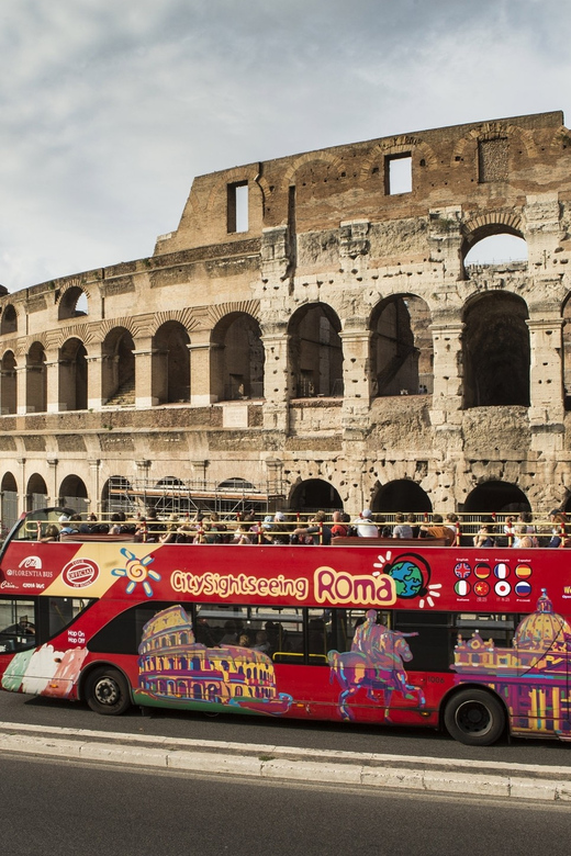 Rome: Hop-on Hop-off Bus Tour and Colosseum Experience - Riding the bus around Rome