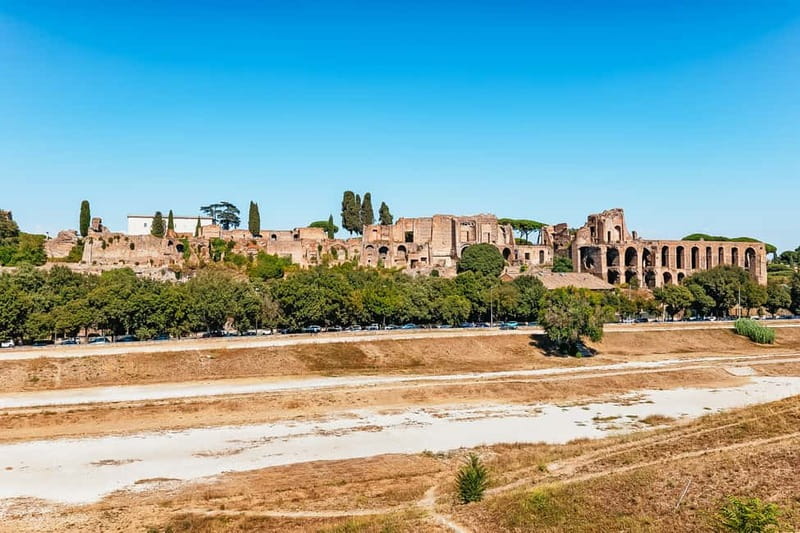 Rome: Hop-on Hop-off Sightseeing Bus Tour with Audioguide - The Colosseum and Roman Forum connection