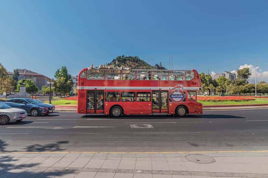 Santiago: Hop-on Hop-off Bus Day Ticket with Audio Guide - Explore Plaza de Armas, the city’s central square