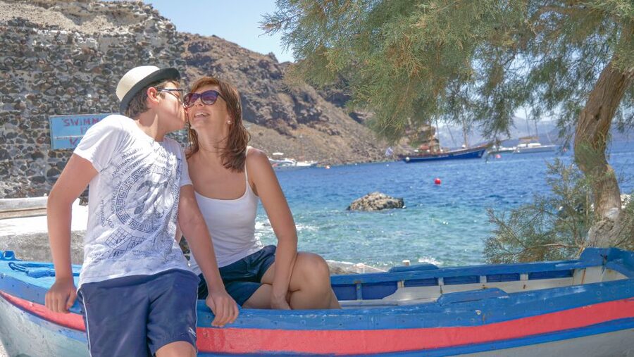 Santorini 2-Day Combo: Volcano Boat Cruise & Island Bus Tour - Emborio and Perissa show a different Santorini