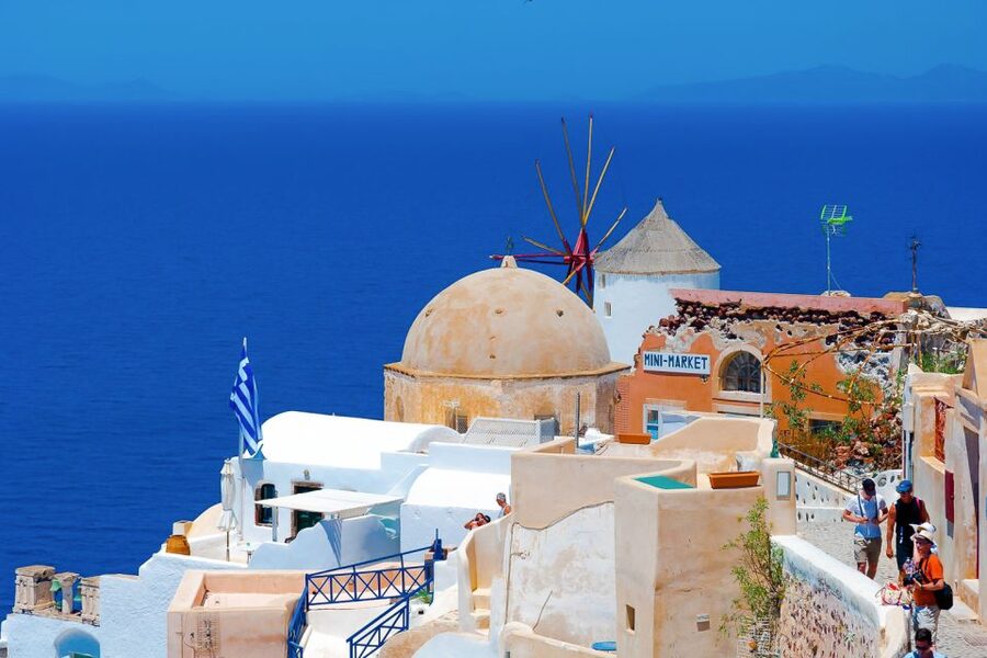 Santorini Island Bus Tour and Caldera Sunset Cruise - Palea Kameni offers a sulfurous swim