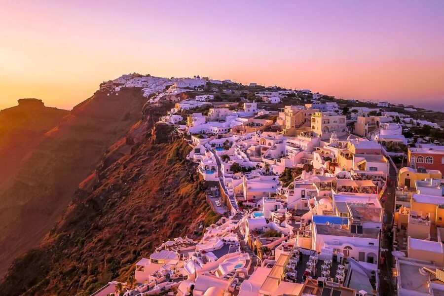 Santorini Island Bus Tour and Caldera Sunset Cruise - Oia sunset is beautiful but comes late