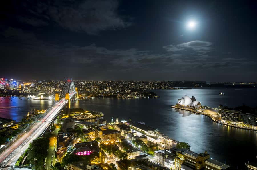 Sydney: Big Bus Panoramic Night Tour by Open-Top Bus - Crossing Sydney Harbour Bridge toward Milsons Point