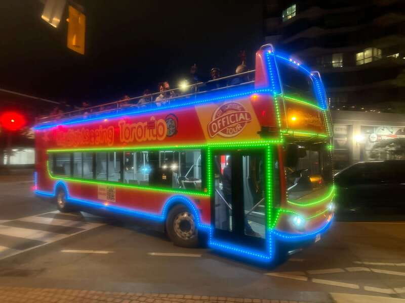 Toronto: Night Sightseeing Tour on a Double-Decker Bus - Starting under the lights at Yonge-Dundas Square