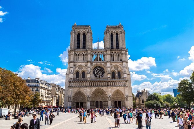 Trip to Paris with Seine Cruise, Bus Tour and Travel Card - The Eiffel Tower, Louvre, and Notre-Dame