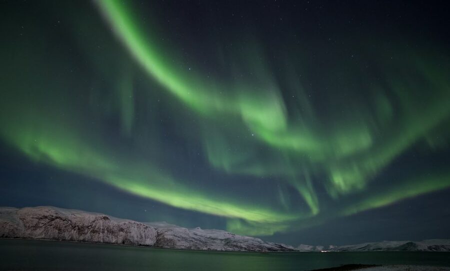 Tromso: Northern Lights Chase with Photo Package Included - Stop one: checking the first clear patch