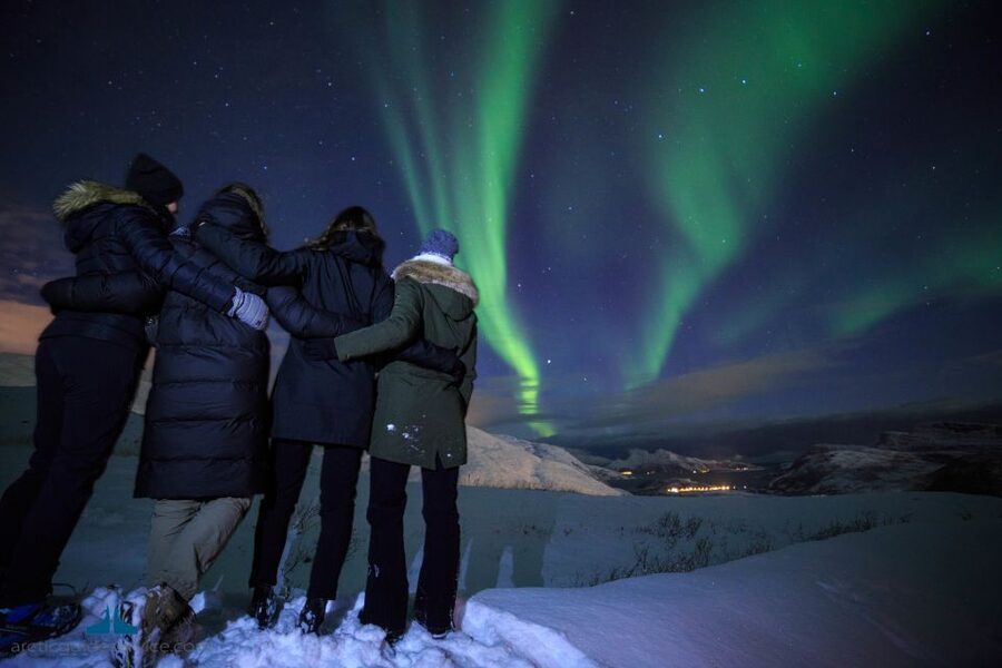 Tromso: Northern Lights Chase with Photo Package Included - Leaving Tromsø in a warm bus