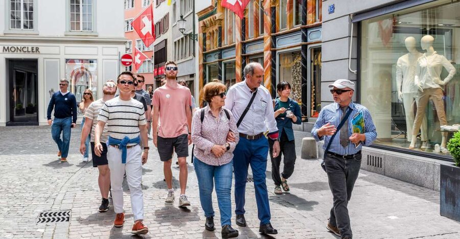 Zurich: City Highlights Tour by Bus, Cable Car, and Ferry - Bahnhofstrasse, Limmatquai, and the city’s historic core